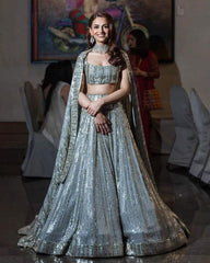 Baby Pink colored georgette lehenga choli