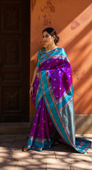 THE BANARASI SAREEIS MADE UP OF SILK THREADS WOVEN USING