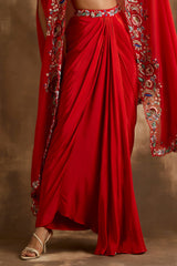 Red draped skirt with embroidered crop top & cape