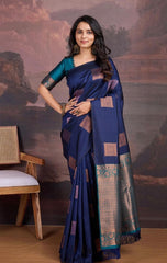 THE BANARASI SAREEIS MADE UP OF SILK THREADS WOVEN USING