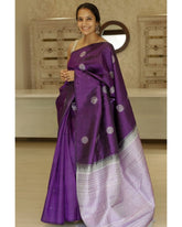 THE BANARASI SAREEIS MADE UP OF SILK THREADS WOVEN USING