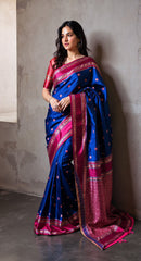 THE BANARASI SAREEIS MADE UP OF SILK THREADS WOVEN USING