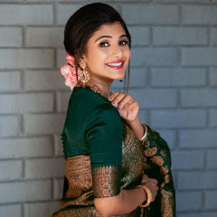 THE BANARASI SAREEIS MADE UP OF SILK THREADS WOVEN USING