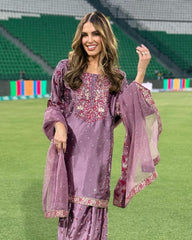 'Grace in Lavender Woman in Embroidered Traditional Outfit at the Stadium'
