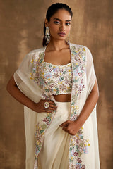 White draped skirt with embroidered crop top & cape