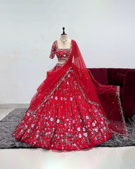 Red color soft net embroidered lehenga choli for women