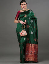 THE BANARASI SAREEIS MADE UP OF SILK THREADS WOVEN USING