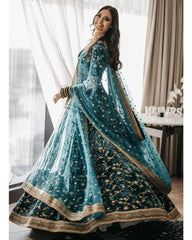 Bottle green colored designer velvet lehenga choli