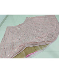Baby Pink colored georgette lehenga choli