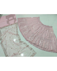 Baby Pink colored georgette lehenga choli