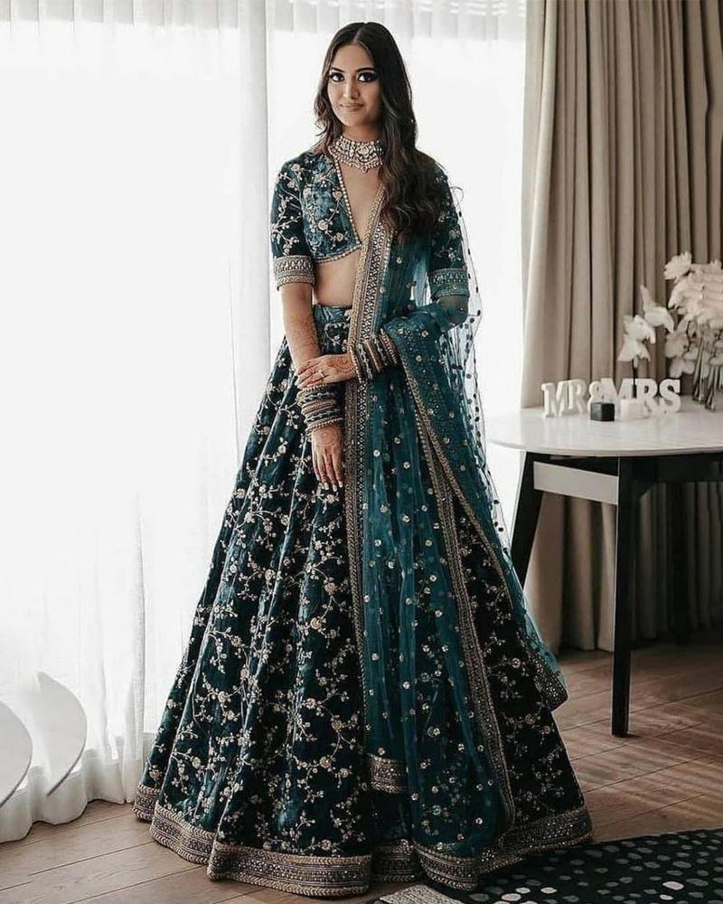 Bottle green colored designer velvet lehenga choli