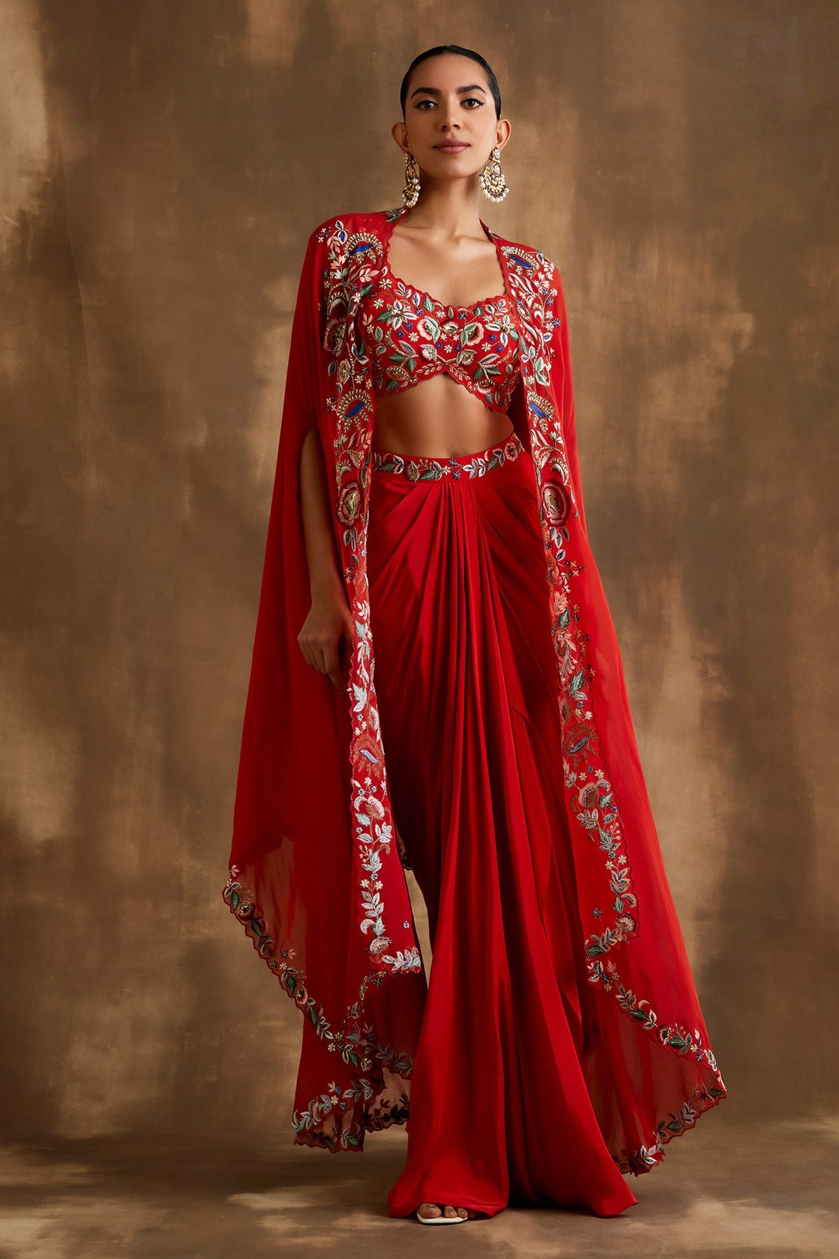 Red draped skirt with embroidered crop top & cape