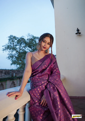 THE BANARASI SAREEIS MADE UP OF SILK THREADS WOVEN USING