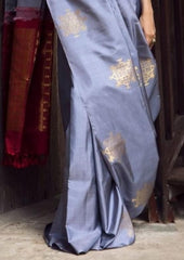 THE BANARASI SAREEIS MADE UP OF SILK THREADS WOVEN USING