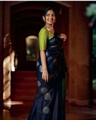 THE BANARASI SAREEIS MADE UP OF SILK THREADS WOVEN USING