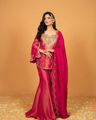Royal elegance in this beautifully embroidered pink Sharara set.
