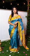 THE BANARASI SAREEIS MADE UP OF SILK THREADS WOVEN USING