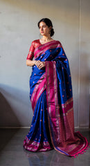 THE BANARASI SAREEIS MADE UP OF SILK THREADS WOVEN USING
