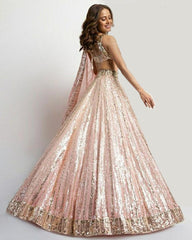 Baby Pink colored georgette lehenga choli