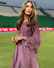 'Grace in Lavender Woman in Embroidered Traditional Outfit at the Stadium'