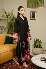 Black top made in soft crepe fabric in floral print.