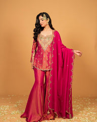 Royal elegance in this beautifully embroidered pink Sharara set.