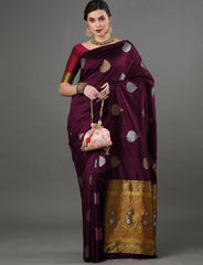 THE BANARASI SAREEIS MADE UP OF SILK THREADS WOVEN USING