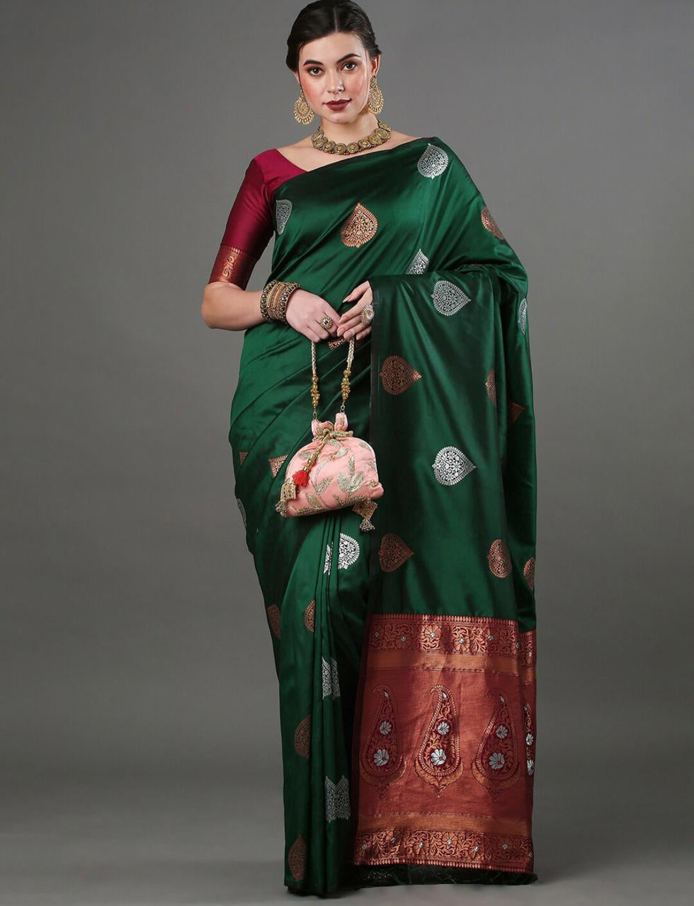 THE BANARASI SAREEIS MADE UP OF SILK THREADS WOVEN USING
