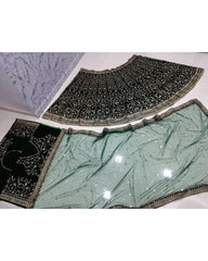 Bottle green colored designer velvet lehenga choli